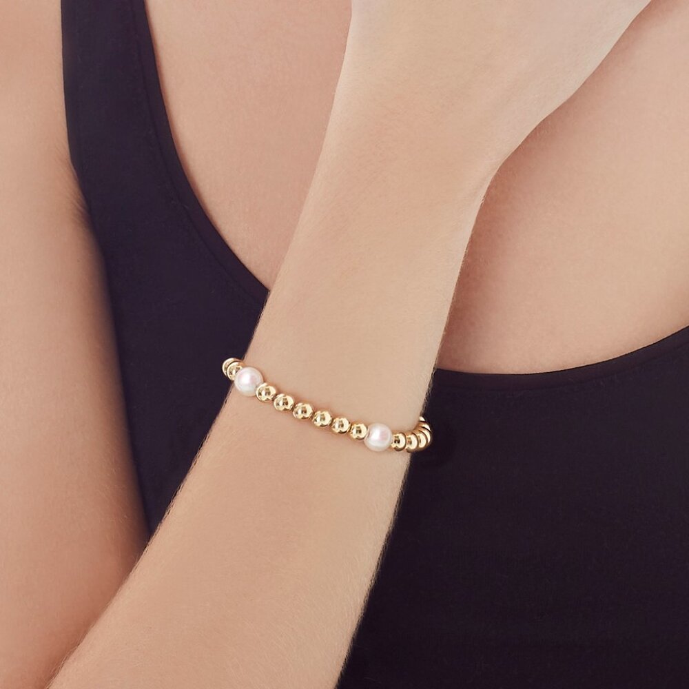 Majorica gold colored bead and pearl like bracelet